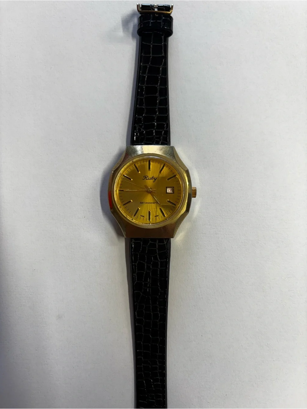 Gold-Tone Watch with Black Leather Strap